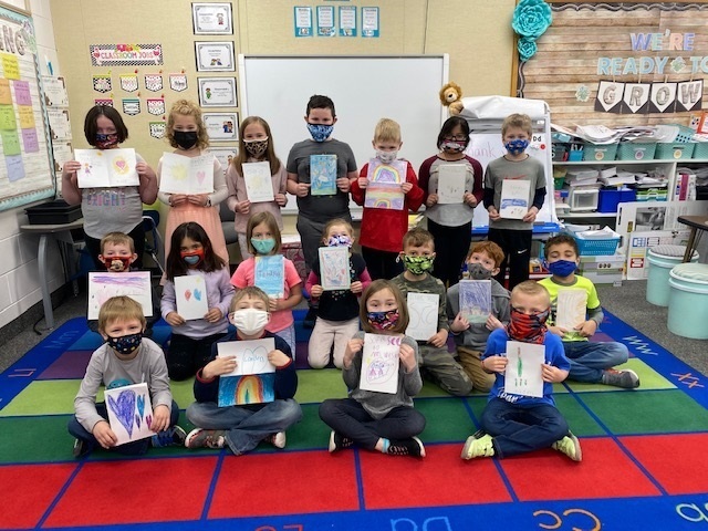 Mrs. Cicha's first grade class with cards.