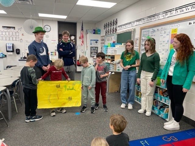 FBLA students come to Mrs. Cicha's  first grade class at SCC Elementary.